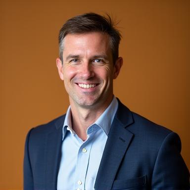 Professional headshot of Ben Carter.